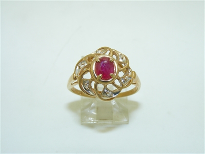 A Natural Diamond and Ruby Yellow Gold Ring